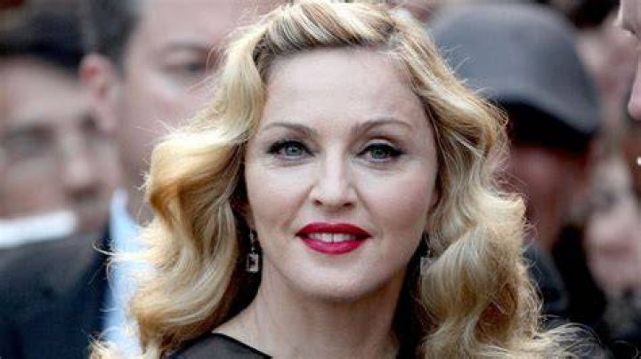 65-year-old Madonna is proudly celebrating her 64th top ten chart hit