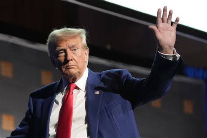 An image of Trump waving on some stairs is very similar to the scene in The Simpsons