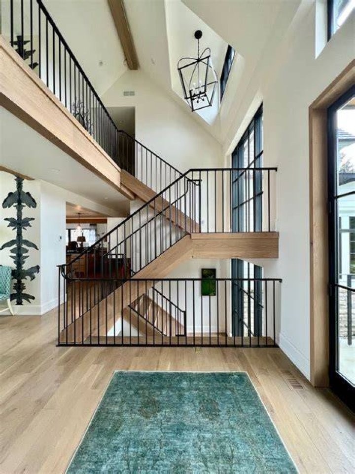 And wide open staircases take occupants to the second and third floors