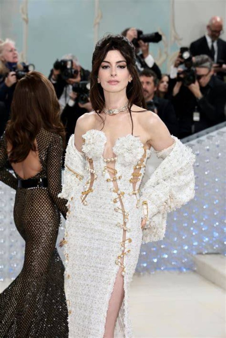 Anne Hathaway attended the Versace show at Milan Fashion Week