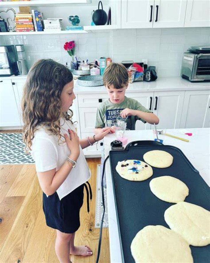 Another featured Vale making blueberry pancakes in the kitchen