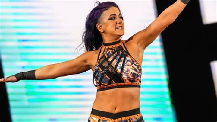 Bayley looks incredible in the ripped-style trousers