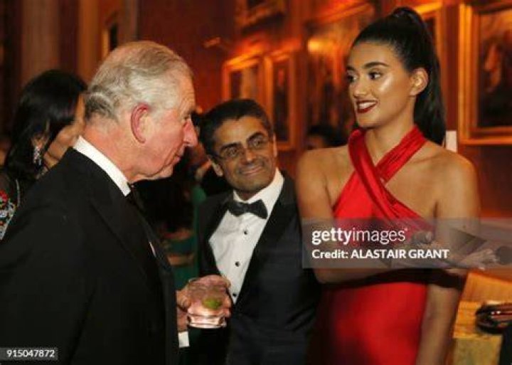 Charles speaks to Neelam Gill at a reception and dinner celebrating the 10th anniversary of the British Asian Trust