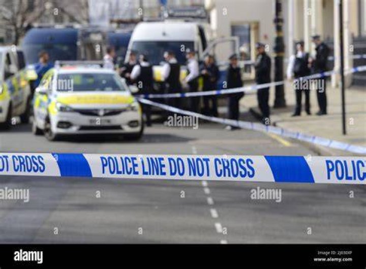 Cops cordoned off the area after an 11-year-old boy was shot