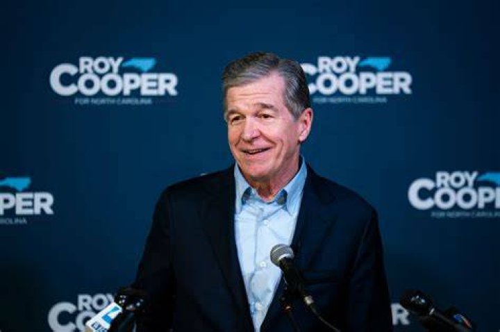 Democratic gubernatorial candidate Roy Cooper and his wife Kristin Cooper