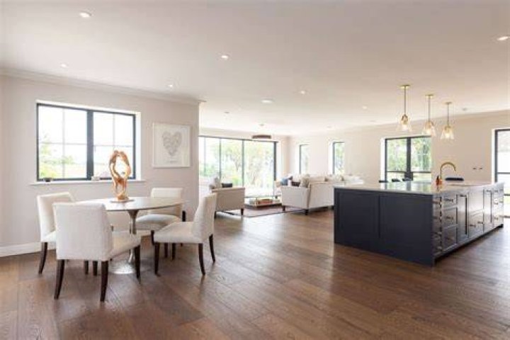 Elegant dining spaces are flooded with natural light