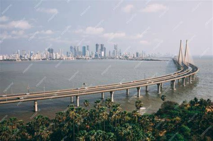 high-angle-shot-bandra-worli-sealink-mumbai-enveloped-with-fog 1