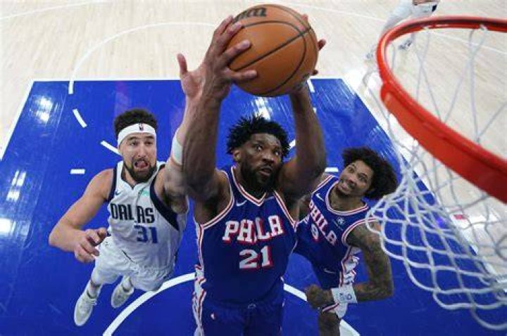 Joel Embiid (bottom) is set to undergo surgery on his left meniscus