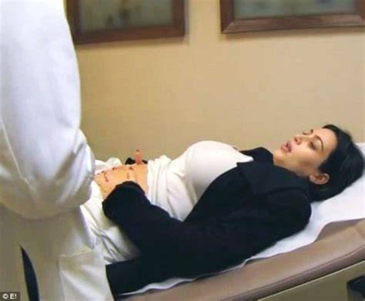 Kim Kardashian winces in pain after clumsy bodyguard accidentally steps on her foot Daily Mail