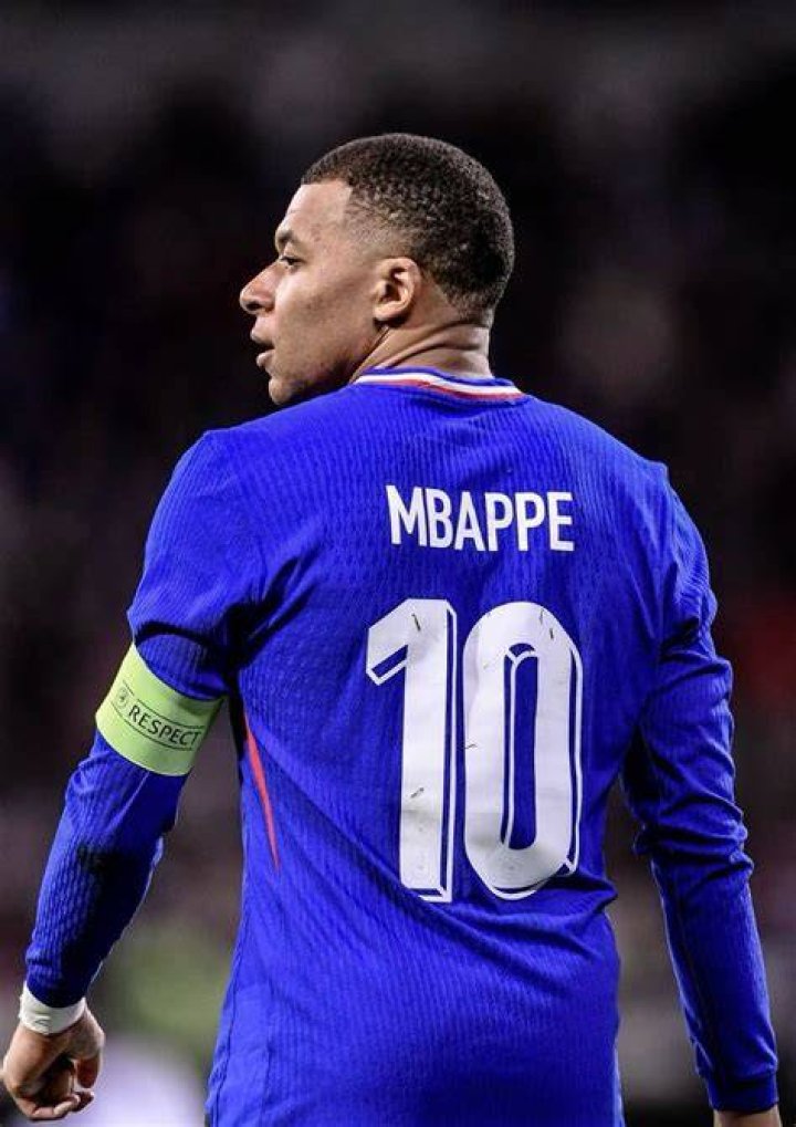 Mbappé wears this kit on the cover.