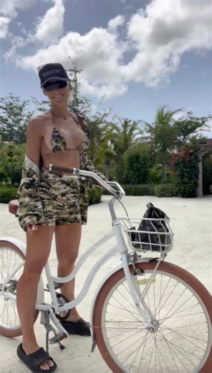 McCool matched the bikini with shorts and a jacket while taking a bike ride