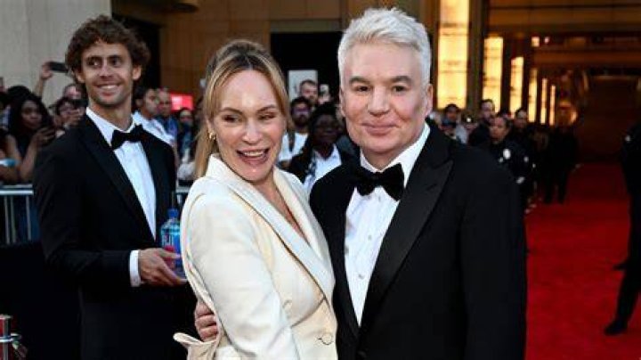 Mike Myers (L) and Kelly Tisdale have been married since 2010