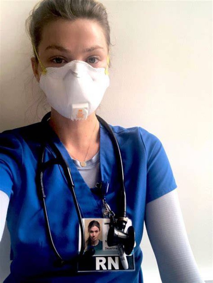 Nurse Maggie Rawlins sizzles in a yellow swimsuit as she takes a break from her work on the Covid frontline