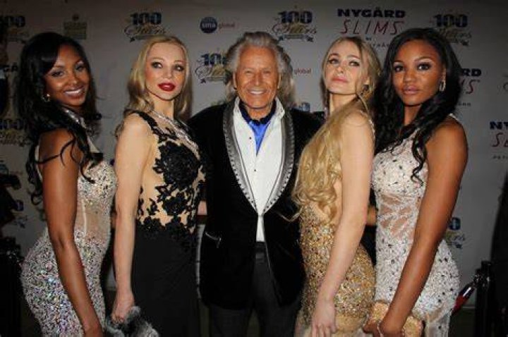 Nygard with models at a fashion show in Helsinki, Finland in 1994