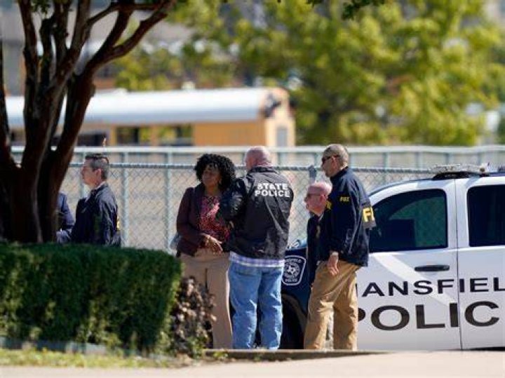 Police Gather in Timberview Lot