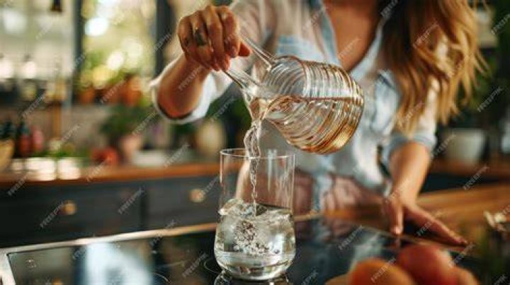 Pouring a Glass of Fresh Organic Green Juice