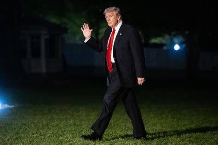 President Trump, pictured returning to the White House on Monday, coughed on live TV on Thursday as he announced plans to hold rallies this weekend - just over a week after he was hospitalized with coronavirus