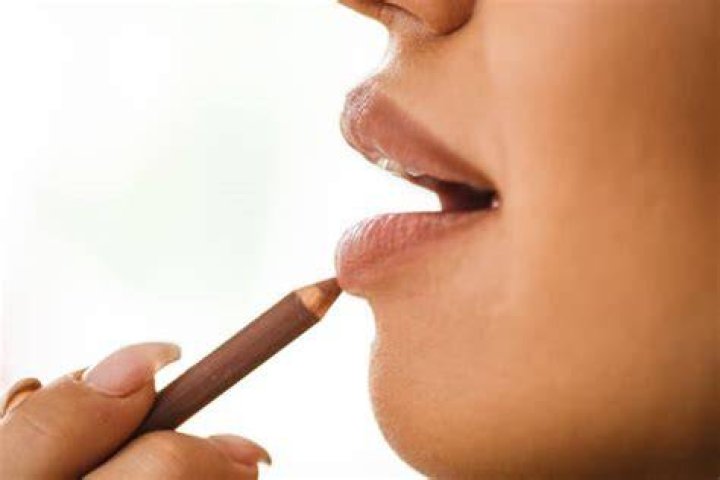 She suggests using a lipliner to draw a line across your nose, creating a shadow effect