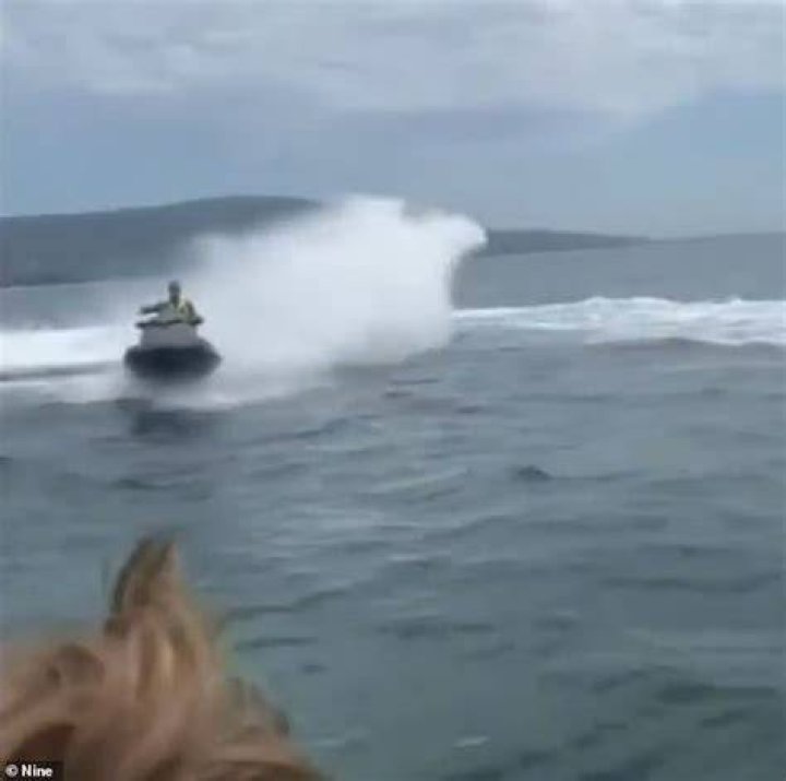 Shocking moment an idiot jet ski rider nearly crashes into a packed boat Daily Mail Online