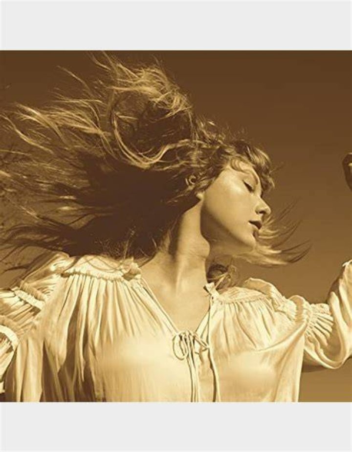 Taylor donned a gold-colored jacket top that revealed her stunning physique