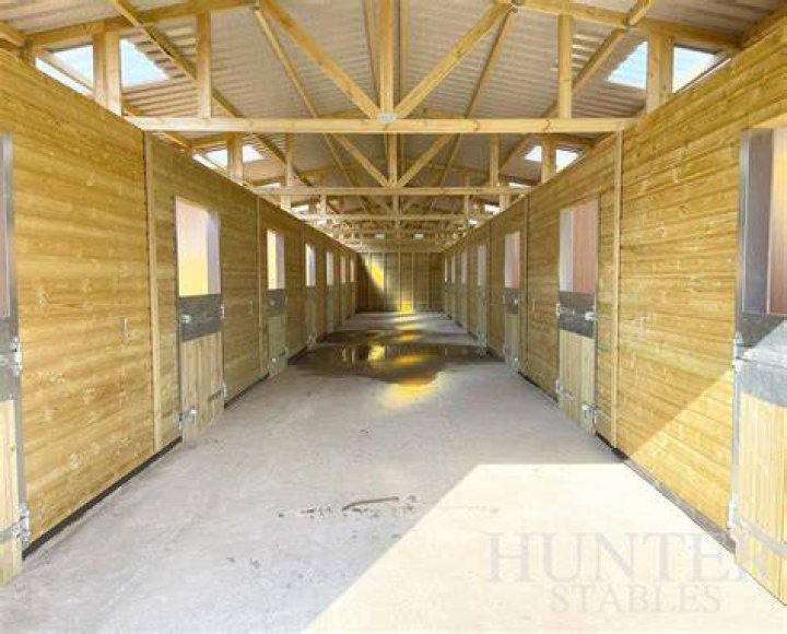 The barns include stable space for horses