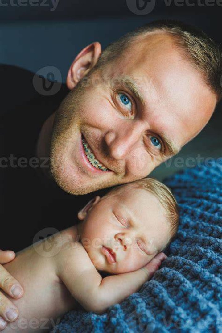 The dad can be seen staggering from the property after the raid
