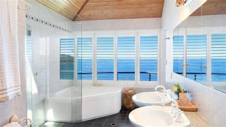 The home has three bathrooms and three bedrooms