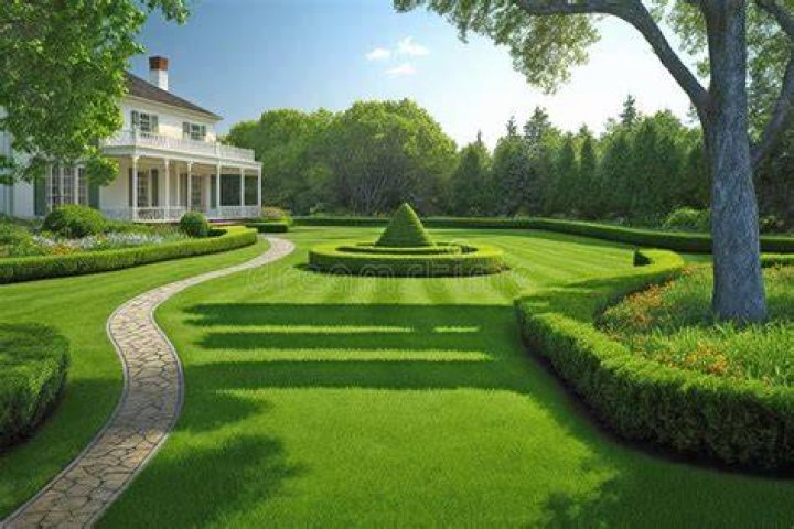 The manicured lawns offer stunning views of the surrounding woodlands