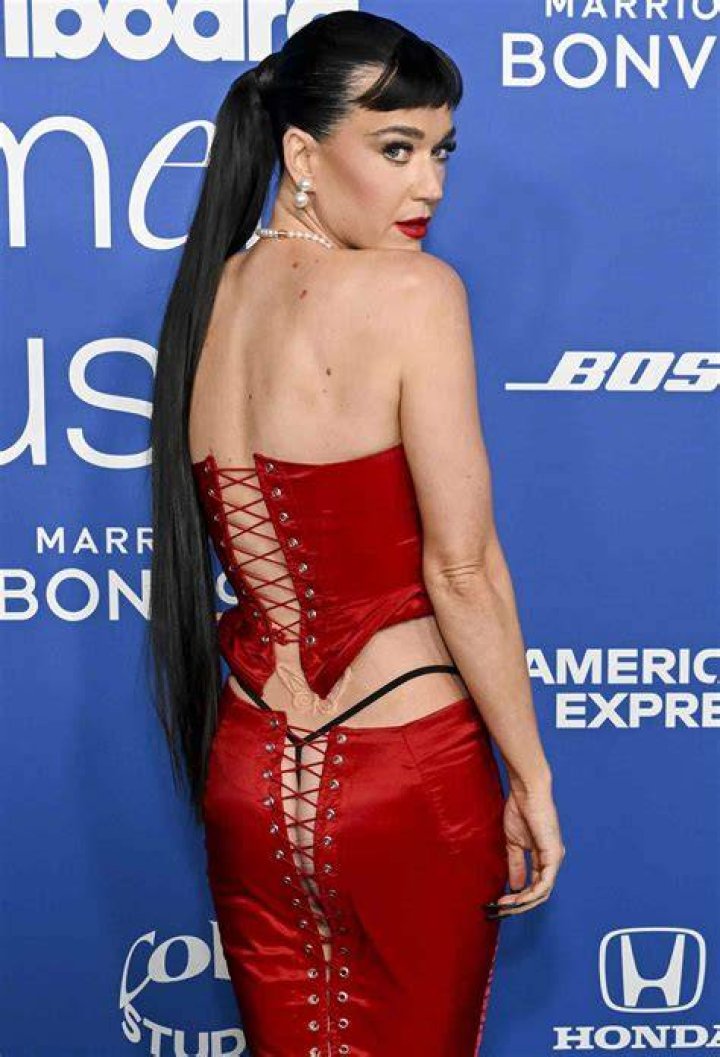 The model wore a bum-baring frock on her big day