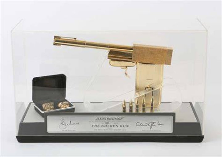 The replica 18-carat gun is among 170 rare pieces of memorabilia likely to make &pound;140,000 next week