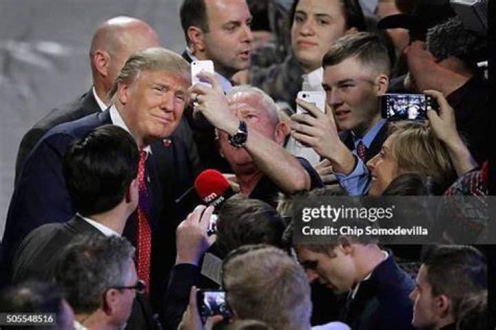 Trump supporters pose for selfies with Capitol Hill cops