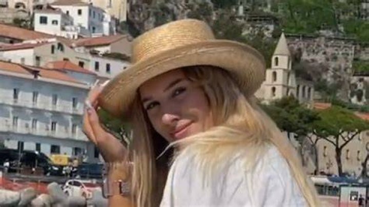Veronika Rajek straddles herself across boat and shows off bum in thong bikini as Tom Brady fan suns herself in Ibiza
