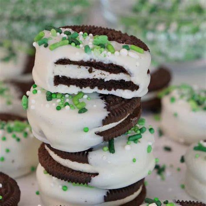 White Chocolate dipped Oeros. Just add food coloring to white velata chocolate. Chocolate