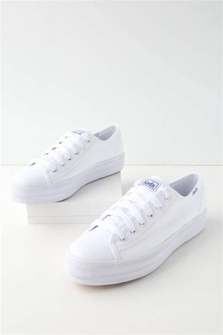 white platform Ked sneakers